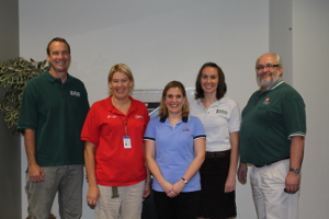 Diane Cooper (middle) with selected members of the Minnesota Silver Jackets Hazard Mitigation Team 
(others from left to right: James Fallon, USGS; Jennifer Nelson, Minnesota Homeland Security-Emergency Management; Christiana Czuba, USGS; and Terry Zien, U.S. Army Corps of Engineers.